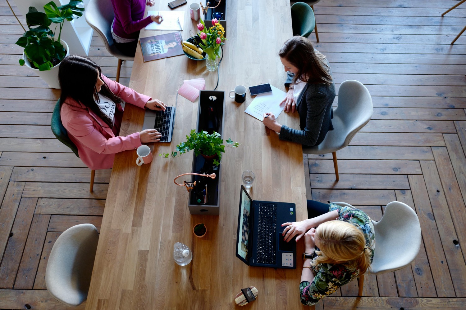 Engineers collaborating in person